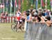 Plaxton had time to greet friends before crossing the finish line 		CREDITS:  		TITLE: MTB XC Nationals 		COPYRIGHT: Rob Jones/www.canadiancyclist.com 2011© All rights retained - no copying, printing or other manipulation, editing or processing permitted 