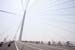 Peloton on the Shanghai Changjiang Tunnel Bridge 		CREDITS:  		TITLE:  		COPYRIGHT: Tour of Chongming Island