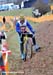 Right after the barriers is a very tricky off-camber, muddy short climb 		CREDITS: Rob Jones 		TITLE: 2011 CycloCross World Championships 		COPYRIGHT: Rob Jones/Canadiancyclist.com