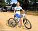 Catharine Pendrel shows off her matching rainbow kit 		CREDITS:  		TITLE: Pietermaritzburg World Cup 		COPYRIGHT: Rob Jones/www.canadiancyclist.com 2012© All rights retained - no use permitted without prior, written permission