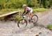 The first half of the lap has two creek crossings 		CREDITS:  		TITLE: 2012 MTB World Championships  		COPYRIGHT: Rob Jones/www.canadiancyclist.com 2012 -copyright -All rights retained - no use permitted without prior, written permission