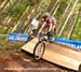 Catharine Pendrel practices the dropoff at the top of the course 		CREDITS:  		TITLE: 2012 MTB World Championships  		COPYRIGHT: Rob Jones/www.canadiancyclist.com 2012 -copyright -All rights retained - no use permitted without prior, written permission