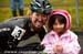 Emily Batty and a young fan 		CREDITS:  		TITLE: 2012 Cyclocross Nationals 		COPYRIGHT: Rob Jones/www.canadiancyclist.com 2012- copyright- All rights retained - no use permitted without prior, written permission