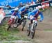 Mechura and Prokop dice it up in the corner - Only two of these Czech riders could move on to the final 		CREDITS:  		TITLE: 2012 MTB World Championships 		COPYRIGHT: Rob Jones/www.canadiancyclist.com 2012 -copyright -All rights retained - no use permitte