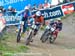 Beerten and Labounkova battle for the lead out of the first corner 		CREDITS:  		TITLE: 2012 MTB World Championships 		COPYRIGHT: Rob Jones/www.canadiancyclist.com 2012 -copyright -All rights retained - no use permitted without prior, written permission