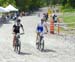 Batty and Pendrel loosen up before the start 		CREDITS:  		TITLE: Mountain Bike XC National Championships 		COPYRIGHT: Rob Jones/www.canadiancyclist.com 2012 -copyright -All rights retained - no use permitted without prior, written permission