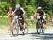 Marie-Helène Premont (Rocky Mountain /ProCycle) and Jean Ann Berkenpas (XPREZO-BORSAO) leading up the climb at the start 		CREDITS:  		TITLE: Mountain Bike XC National Championships 		COPYRIGHT: Rob Jones/www.canadiancyclist.com 2012 -copyright -All right