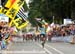 With Belgian flags overhead, Gilbert rolls into the finish ahead of the chasing pack 		CREDITS:  		TITLE: Road World Championships 		COPYRIGHT: Rob Jones/www.canadiancyclist.com 2012 -copyright -All rights retained - no use permitted without prior, writte