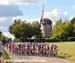 The peloton rolls past the obligatory windmill 		CREDITS:  		TITLE: Road World Championships 		COPYRIGHT: Rob Jones/www.canadiancyclist.com 2012 -copyright -All rights retained - no use permitted without prior, written permission