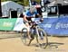 Haley Golding stopped for medical attention during the race 		CREDITS:  		TITLE: MTB World Championships, Pietermaritzburg 		COPYRIGHT: Rob Jones/www.canadiancyclist.com 2013 -copyright -All rights retained - no use permitted without prior, written permis