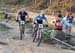 Sandra Walter about to be passed by Maxime Marotte 		CREDITS:  		TITLE: MTB World Championships, Pietermaritzburg 		COPYRIGHT: Rob Jones/www.canadiancyclist.com 2013 -copyright -All rights retained - no use permitted without prior, written permission