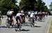 The bunch strings out on one of the short climbs 		CREDITS:  		TITLE: Tour de Delta 		COPYRIGHT: Rob Jones/www.canadiancyclist.com 2013 -copyright -All rights retained - no use permitted without prior, written permission