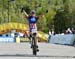 Kate Courtney (USA) wins 		CREDITS:  		TITLE: Mont Ste Anne World Cup 2013 		COPYRIGHT: Rob Jones/www.canadiancyclist.com 2013 -copyright -All rights retained - no use permitted without prior, written permission