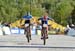 Gabrielle April (Team Canada) and Kaylee Blevins (USA) sprint for 6th place 		CREDITS:  		TITLE: Mont Ste Anne World Cup 2013 		COPYRIGHT: Rob Jones/www.canadiancyclist.com 2013 -copyright -All rights retained - no use permitted without prior, written per