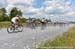 Rolling through the gravel 		CREDITS:  		TITLE: 2013 Road National Championships 		COPYRIGHT: Rob Jones/www.canadiancyclist.com 2013 -copyright -All rights retained - no use permitted without prior, written permission