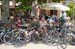 Bikes outside a cafe await their owners 		CREDITS:  		TITLE: 2013 Tour de France 		COPYRIGHT: © CanadianCyclist.com 2013