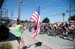 Fan flies the flag in Monterey 		CREDITS:  		TITLE: Amgen Tour of California, 2014 		COPYRIGHT: © Casey B. Gibson 2014