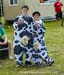 The cow kids were handing out chocolate milk to the finishers 		CREDITS:  		TITLE: Canada Cup #3, Sudbury ON 		COPYRIGHT: Robert Jones-2014 Canadian Cyclist, no use without permission