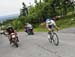 Tuft checks for chasers 		CREDITS:  		TITLE: 2014 Road Nationals 		COPYRIGHT: Rob Jones/www.canadiancyclist.com 2014 -copyright -All rights retained - no use permitted without prior, written permission