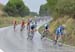 The main bunch descends back into town in the rain 		CREDITS:  		TITLE: 2014 Road World Championships Ponferrada Spain 		COPYRIGHT: Rob Jones/www.canadiancyclist.com 2014 -copyright -All rights retained - no use permitted without prior, written permission