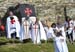 A modern version of the Knights Templar showed up to watch the race 		CREDITS:  		TITLE: 2014 Road World Championships Ponferrada Spain 		COPYRIGHT: Rob Jones/www.canadiancyclist.com 2014 -copyright -All rights retained - no use permitted without prior, w