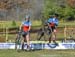 West and Holmgren over the barriers 		CREDITS:  		TITLE: 2015 Ontario CX Provincials 		COPYRIGHT: Rob Jones/www.canadiancyclist.com 2015 -copyright -All rights retained - no use permitted without prior, written permission