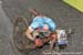 Peter Disera collapsed after crossing the line 		CREDITS:  		TITLE: 2015 MTB World Championships, Vallnord, Andorra 		COPYRIGHT: Rob Jones/www.canadiancyclist.com 2015 -copyright -All rights retained - no use permitted without prior, written permission