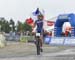 Antoine Philipp flys the flag for French gold 		CREDITS:  		TITLE: 2015 Mountain Bike World Championships, Vallnord, Andorra 		COPYRIGHT: Rob Jones/www.canadiancyclist.com 2015 -copyright -All rights retained - no use permitted without prior, written perm