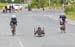 Womens B tandems catch some of the handcycles 		CREDITS:  		TITLE: 2015 Road Nationals 		COPYRIGHT: Rob Jones/www.canadiancyclist.com 2015 -copyright -All rights retained - no use permitted without prior, written permission