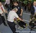 Officials check Canadian bike 		CREDITS:  		TITLE: 2016 Track World Championships, London UK 		COPYRIGHT: Rob Jones/www.canadiancyclist.com 2016 -copyright -All rights retained - no use permitted without prior, written permission