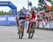 The sprint for bronze between Batty and Wloszczowska 		CREDITS: Rob Jones/www.canadiancyclist.co 		TITLE: 2016 MTB World Championships 		COPYRIGHT: Rob Jones/www.canadiancyclist.com 2016 -copyright -All rights retained - no use permitted without prior; wr