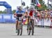 The sprint for bronze between Batty and Wloszczowska 		CREDITS: Rob Jones/www.canadiancyclist.co 		TITLE: 2016 MTB World Championships 		COPYRIGHT: Rob Jones/www.canadiancyclist.com 2016 -copyright -All rights retained - no use permitted without prior; wr