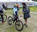 Mackenzie Myatt talks with NextGen coach Jeff Ain before the start 		CREDITS:  		TITLE: XC World Cup 1, Nove Mesto, Czech Republic 		COPYRIGHT: Rob Jones/www.canadiancyclist.com 2017 -copyright -All rights retained - no use permitted without prior; writte