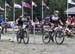 Quinton Disera hands off to Gunnar Holmgren 		CREDITS:  		TITLE: 2017 XC Championships 		COPYRIGHT: Rob Jones/www.canadiancyclist.com 2017 -copyright -All rights retained - no use permitted without prior; written permission