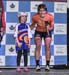 Sara Bergen with a young presenter 		CREDITS:  		TITLE: Grand Prix Cycliste Gatineau, Road Race 		COPYRIGHT: ob Jones/www.canadiancyclist.com 2018 -copyright -All rights retained - no use permitted without prior; written permission