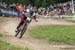 Amaury Pierron (Fra) Commencal / Vallnord on his way to a 3rd straight victory 		CREDITS:  		TITLE: Val di Sole DH World Cup 4 		COPYRIGHT: Fraser Britton