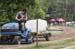 Wetting the track to control the dust 		CREDITS:  		TITLE: Hardwood Canada Cup 2018 		COPYRIGHT: Marek Lazarski