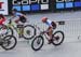 Laurie Arseneault hands off to Haley Smith 		CREDITS:  		TITLE: 2018 MTB World Championships, Lenzerheide, Switzerland 		COPYRIGHT: Rob Jones/www.canadiancyclist.com 2018 -copyright -All rights retained - no use permitted without prior; written permission