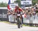 Annika Langvad (Specialized Racing) does a should check before she unleashes her sprint 		CREDITS:  		TITLE: 2018 UCI World Cup Nove Mesto 		COPYRIGHT: Rob Jones/www.canadiancyclist.com 2018 -copyright -All rights retained - no use permitted without prior