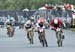 Mathieu van der Poel does an underarm check as Gaze passes 		CREDITS:  		TITLE: 2018 UCI World Cup Nove Mesto 		COPYRIGHT: Rob Jones/www.canadiancyclist.com 2018 -copyright -All rights retained - no use permitted without prior; written permission