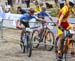 Catharine Pendrel hands off to Peter Disera 		CREDITS:  		TITLE: Team Relay World MTB Championships, 2019 		COPYRIGHT: Rob Jones/www.canadiancyclist.com 2019 -copyright -All rights retained - no use permitted without prior, written permission