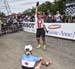 Nathalie Schneitter salutes the crowd 		CREDITS:  		TITLE: World MTB Championships, 2019 		COPYRIGHT: Rob Jones/www.canadiancyclist.com 2019 -copyright -All rights retained - no use permitted without prior, written permission