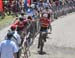 Holden Jones hands off to Cody Scott 		CREDITS:  		TITLE: 2019 MTB XC National Championships 		COPYRIGHT: Rob Jones CanadianCyclist.com