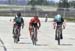 3 up sprint for the line 		CREDITS:  		TITLE: Ontario Police College Criterium 		COPYRIGHT: Rob Jones/www.canadiancyclist.com 2019 -copyright -All rights retained - no use permitted without prior, written permission